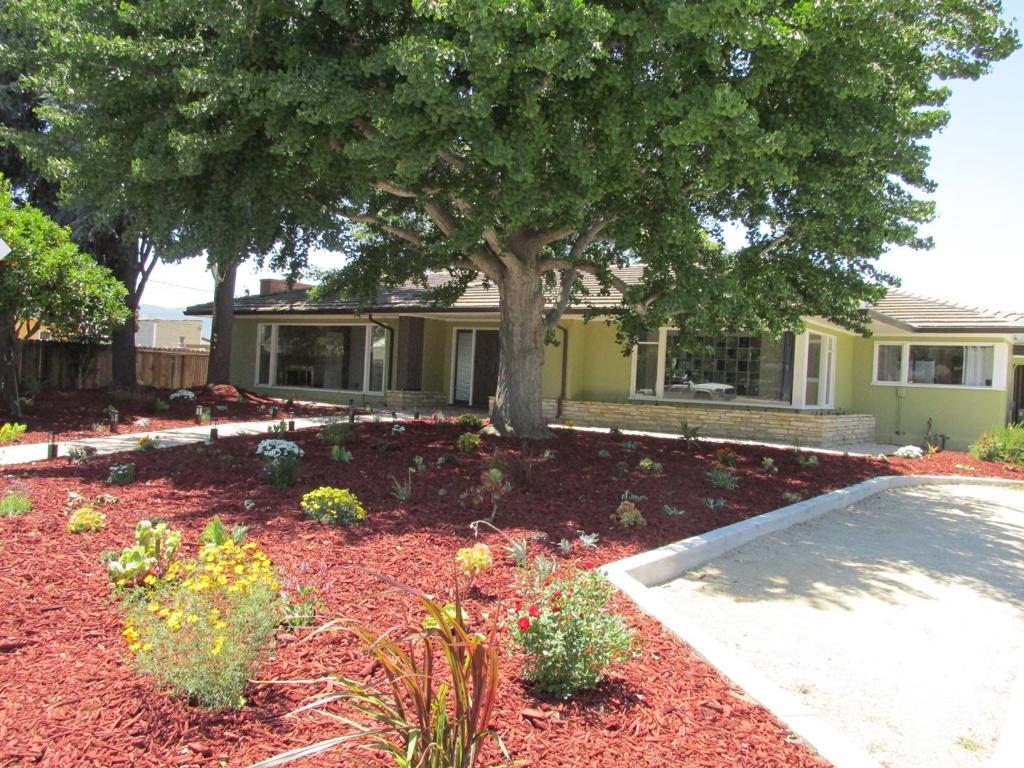 Must See! Nicely remodeled home. Has a detached studio. Possible ADU on this large lot. All appliances are less than 3 years old and include refrigerators and washer/dryers. The downstairs basement has separate entrance, full bath plus dry sauna. Mature landscaping. large back patio including built in BBQ with spit. Great for entertaining.