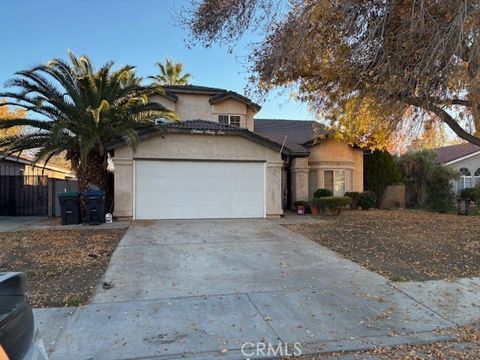 Photo of 1642 Bisbee Pl, Lancaster, CA 93535 (MLS # MB25276347)