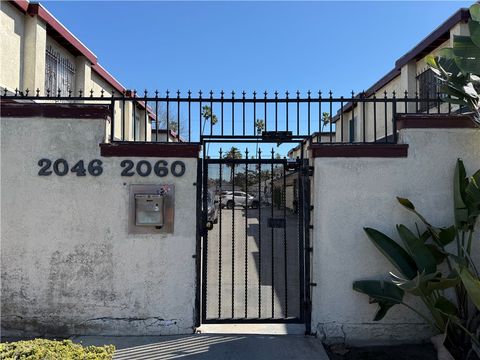 Photo of 2052 Lewis Ave, Long Beach, CA 90806 (MLS # PW26061837)