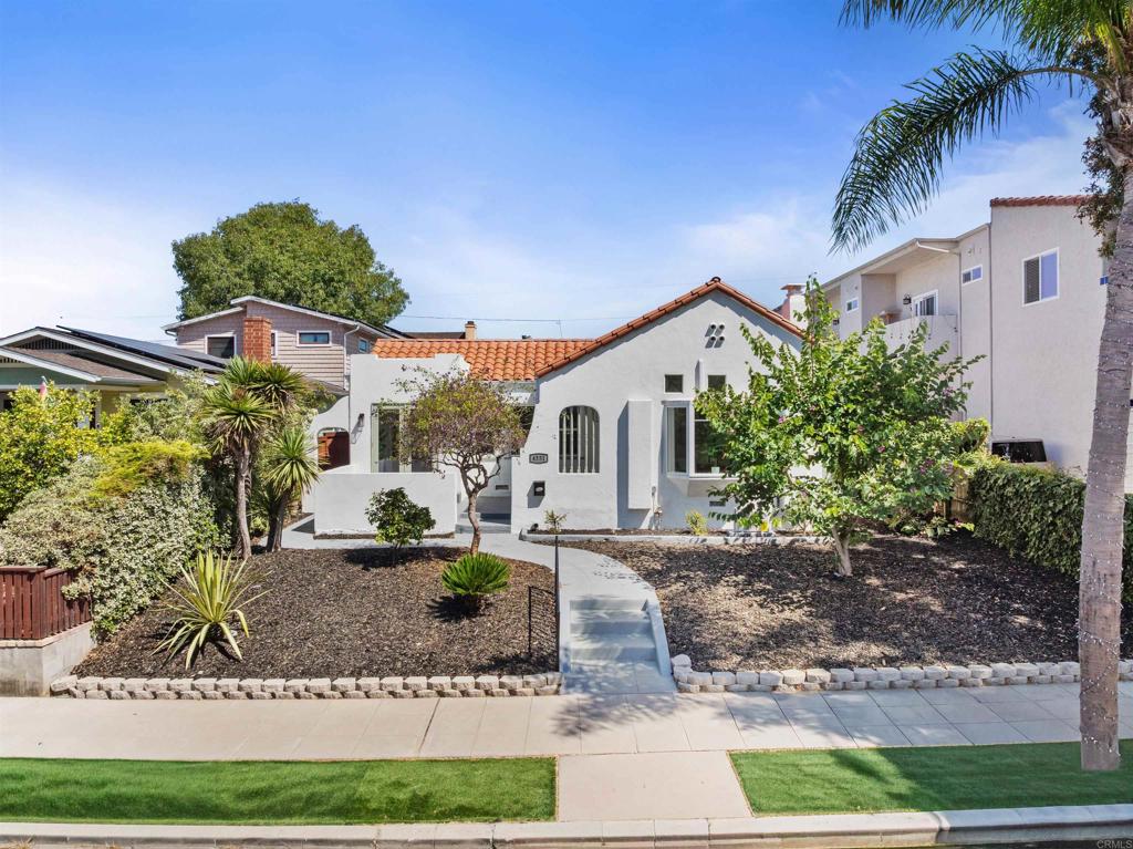 Welcome to 4551 Maryland St – a beautifully renovated Spanish-style home blending timeless character with modern elegance. This 4-bedroom, 3-bathroom residence offers 1,858 square feet of living space on a generous 6,455 sq ft lot. Originally built in 1926, the home has been thoughtfully updated while maintaining its original charm. Step inside to discover a stunning modern Spanish design, featuring a gorgeous kitchen with quartz countertops, a stylish tile backsplash, and high-end finishes throughout. The inviting courtyard provides a peaceful retreat to relax and unwind, while the dedicated laundry room adds convenience to everyday living. The 3-car garage and alley access further enhance the potential, offering ample parking and expansion opportunities. Whether you're an investor, developer, or homeowner looking for a unique and versatile property in one of San Diego’s most desirable neighborhoods, this is a must-see opportunity.