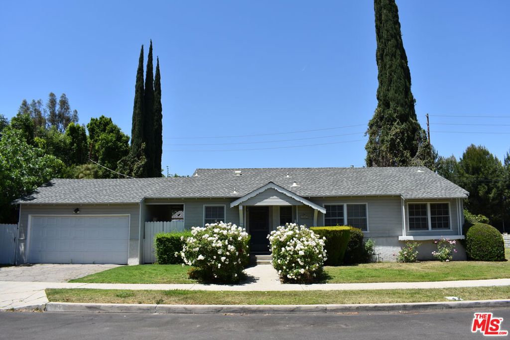 Introducing a charming property perfectly situated in the heart of Tarzana, offering a wonderful blend of comfort, convenience, and natural beauty. Nestled in a tranquil cul-de-sac, this unfurnished home boasts a fantastic location just a short stroll away from the picturesque Tarzana Recreation Center/Park and the G Line (Orange). Prepare to be captivated by the inviting neighborhood feel and the incredible amenities this residence has to offer. Step into a freshly painted, light-filled space adorned with beautiful hardwood floors throughout. The open-concept design seamlessly combines an eat-in kitchen and a spacious dining room, creating a perfect atmosphere for entertaining family and friends. The kitchen features modern appliances, including a refrigerator, gas range oven, and dishwasher, ensuring convenience and efficiency in your daily routine. As you explore the home, you'll be greeted by the elegance of white shutters that adorn the windows, allowing you to adjust the natural light to your preference. The property also offers the convenience of a washer and dryer, ensuring that laundry day is a breeze. The detached two-car garage provides ample parking space, and the driveway allows for additional parking options. Landlord takes care of the monthly landscaping service, freeing you from the hassle of yard maintenance. With central AC and heating, you can enjoy optimal comfort throughout the year. Immerse yourself in the vibrant Tarzana community, with a variety of shopping and dining options just moments away. Whether you're seeking outdoor adventures, convenient access to public transportation, or a serene retreat within the city, this property is your perfect match. Don't miss out on this incredible opportunity! Contact us today to schedule a viewing and make this beautiful Tarzana property your own. Act now and start living your dream lifestyle!