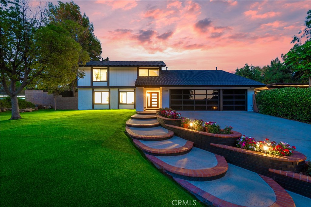Perfectly sited on just over a 1/2 Acre lot, this stunning residence has been completely re-imagined & is now awaiting it's new owners.
Exuding modern luxury finishes in a tranquil & private setting this home checks all the boxes. Enjoy beautiful oak flooring throughout, soft white LED lighting & thoughtfully appointed sparkling chandeliers which accent the focal points of the home. All new windows, complete with 2 sets of folding glass doors in lieu of traditional sliders enable almost the entire back of the home to be open to the outside for a true entertainer's dream.
Revel in your all new Chef's kitchen, complete with 6 burner Viking stove & Viking refrigerator & sleek, ultra-modern cabinetry topped with luxurious perla venata quartzite counter-tops. Your guests will be hanging out around the matching kitchen island while you entertain them with appetizers.
From there you can move to the contemporary dining room featuring your newly clad-in taj mahal fireplace as a focal point of the space.
Or you may choose to retire in the Family room which features one of the two large banks of folding glass doors leading to the outside patio.
Boasting 3 full bedrooms & 2 full bathrooms downstairs there is plenty of room for family or guests. Both downstairs bathrooms are also luxuriously appointed with beautiful tile & surround work & lighted vanity mirrors.
A motion activated stairway lights your way upward, guiding you to your all new enormous master suite, featuring 3 closets a sitting area! The en-suite bathroom has the latest spa-style design featuring an in shower soaking tub & a lighted vanity mirror on a floating vanity.
The grounds are ample and serene with a waterfall next to the pool to add ambiance outside or inside with the folding doors opened up. The pool can be heated and has 2 separate covered rustic cabanas for your enjoyment to just relax or read a book. In addition, there is also a large deck off of the home overlooking the lower grounds of fruit trees that is perfect for meditation, cocktail parties, or just relaxing by yourself with large mature trees providing ample shade & serenity to the space. The lower grounds could also easily accommodate a secondary dwelling, clubhouse, nursery, or whatever you decide.
Lastly, this home features a 3 car garage with new epoxy flooring & a driveway that will hold up to 4 cars.
This is truly a gem to see in person. Please call to schedule your private tour today.