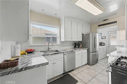 Photo of 4629 Dunrobin Avenue, Lakewood, CA 90713 (MLS # RS26137929)