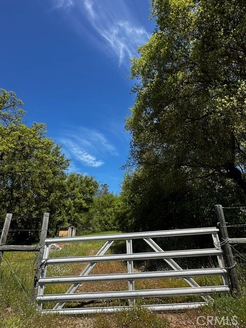 80 serene acres with views. Gentle rolling land with trees and granite outcroppings. Enjoy the peace and quiet of the foothills. Perfect for the private getaway spot. There is a well in place. Easily accessible.