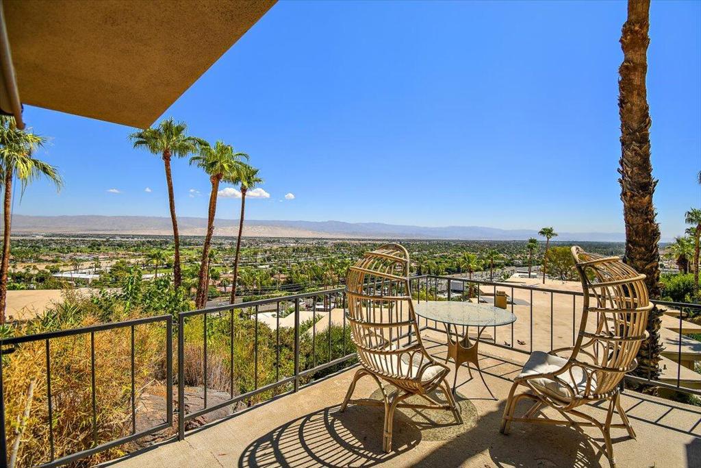 This condominium unit is located in the desirable area of South Palm Springs in Rim Crest Community. This 2 Bedroom 2 bath condo includes a full-sized dining area off the kitchen and living room that seats up to six people, a private patio with a magnificent view of Palm Springs, the kitchen is fully furnished with dishes, silverware, glassware, utensils, cookware, bakeware, microwave, gas stove. Double door fridge, 12 bottle wine cooler and a number of small appliances, a Den or 3rd Bedroom with a Fireplace, master bedroom has a California King bed with walk-in closet & En Suite bath with a shower and double vanity, guest bedroom has a California King bed with a large closet with an adjacent bathroom, tub/shower combination. This is a one of kind unit don't waitSeller with Consider short term 3 months or more at $4000 a month