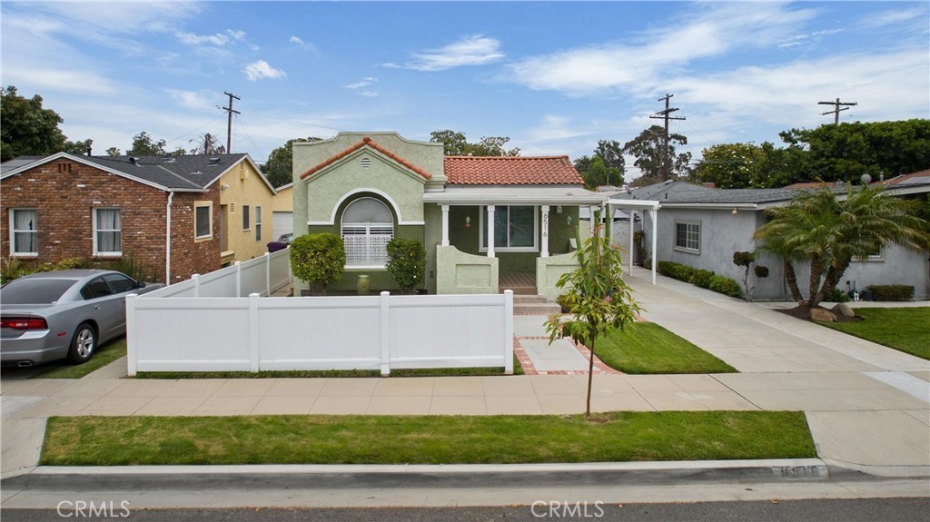 Absolutely impeccable single level home with patio addition that shows like a model home! Everything has been remodeled including this impressive kitchen with stainless steel appliances, all new cabinetry, pull out shelving, quartz countertops and new fixtures! Every square inch of this home has been lovingly maintained! This home has so much character from it's Spanish architecture, to the beamed ceilings, archways and covered porch! There is a brand new roof, new central air and forced air heater, new plumbing, new double paned windows, newly remodeled bathroom, flooring and paint! The back yard features a Trex deck patio and plenty of room! Two spacious bedrooms, one with mirrored wardrobe doors and second with walk in closet. There is a private driveway and a single car garage plus an additional storage room. Welcome home!