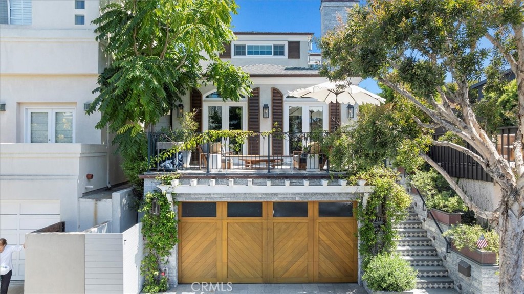 Discover the perfect blend of beachside living and modern comfort in this beautiful 4-bedroom, 3-bath home, ideally situated in the heart of the highly sought-after South Manhattan Beach Sand Section. Located just steps from the beach, downtown Manhattan Beach, Valley Park, and award-winning Robinson Elementary, this home offers walkability and convenience in one of the most desirable neighborhoods in the South Bay. Upon entry, you’ll be greeted by a spacious, light-filled layout with high ceilings, open living spaces, and a thoughtfully remodeled kitchen ideal for hosting and everyday living. French doors off both the living room and family room create a seamless indoor-outdoor flow — leading to a generous front deck and a rare private backyard retreat complete with an in-ground spa, fire pit and built-in BBQ. All four bedrooms are located upstairs, offering a functional floor plan. Additional features include a two-car garage, laundry, and a prime position on a quiet street with quick access to the Greenbelt and downtown. Experience cool ocean breezes and a true sense of coastal tranquility in this one-of-a-kind seaside stunner. 14-month minimum lease required.