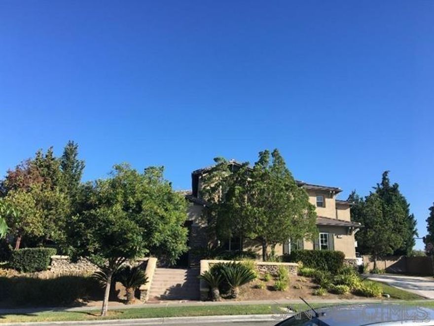 Reduced price, motivated Seller.  Excellent opportunity to own a Stunning Former Model Home!  Recently painted. This elegant home showcases designer-selected features, including premium travertine flooring throughout on first level. Spacious Layout 5 bedrooms, 5 baths, a huge loft, and a private study. Sophisticated Living Spaces as formal dining and living room. Gourmet Kitchen w Granite countertops, a butler’s pantry, stainless steel appliances, custom cabinetry. Luxury, enormous, Master Suite, with beautiful stone accents, a cozy fireplace, and a spa-like bath. Outdoor Charm w Stamped concrete patio and French doors leading to outdoor spaces with exterior enjoyable fireplace, in addition; FP in Living Room, Family Room, and Master bedroom, total of 4 FP. Recessed lighting, a 3-car garage, plenty of parking spaces.   High-end finishes throughout. This home is a must-see!  Price to Sell!!!