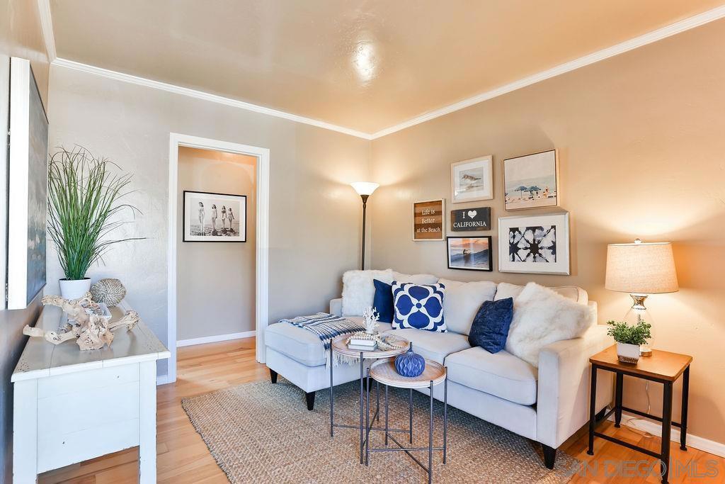 Bring your surf boards & your sunscreen! This cream puff top floor end unit features 1br/1ba, wood floors, dual paned vinyl windows, updated kitchen, remodeled bath, private laundry, oversized 1 car garage plus another offstreet parking spot. Enjoy killer ocean & palm tree views to the South plus ocean, nightlight & fireworks views to the North. Just blocks to Sunset Cliffs, sandy beaches, cafes, nightlife & shopping. OB is known for it quirky, beachy, laid back vibe & this is home is located in the best part. Don't miss your opportunity to live the dream.. just get here quick! Equipment: Dryer,Garage Door Opener, Range/Oven, Washer Sewer: Sewer Connected Topography: LL