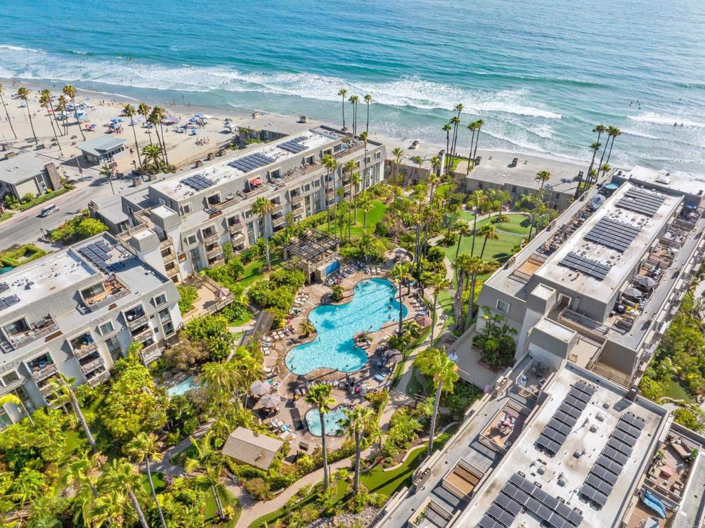 Oceanfront Bliss Awaits – Turnkey Vacation Escape! Experience the ultimate SoCal lifestyle in this beautifully remodeled 1-bed, 1-bath condo on the 3rd floor of the coveted oceanfront resort, North Coast Village. Enjoy unobstructed west-facing ocean views and nightly sunsets from your private balcony—a true sanctuary to unwind. Inside, the open-concept living space is bright and inviting. The kitchen boasts granite counters, sleek cabinetry, and stainless appliances, letting you cook while watching the waves. Coastal charm flows throughout, with updated finishes and beach-inspired décor. Fully furnished and move-in ready, this retreat is equally ideal for relaxing solo or entertaining guests. A proven short-term rental with excellent reviews, this unit offers flexibility as a personal getaway or income-producing investment. North Coast Village is a gated resort community with lush landscaping, waterfalls, and top-tier amenities: two heated pools, spa, sauna, fitness center, clubhouse, putting green, billiards, and underground parking—all just steps from the sand. Walk to local cafés, the harbor, and vibrant coastal dining. Whether you're looking to invest, vacation, or live full-time, this oceanfront gem offers a rare chance to own a piece of paradise. Live the beach life—at North Coast Village.