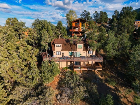 Photo of 16717 Quail PL, Pine Mountain Club, CA 93222 (MLS # SR26190360)