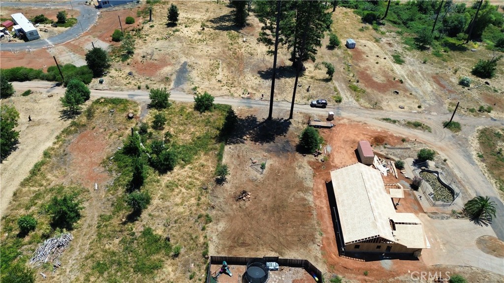 Welcome to your opportunity to build in the heart of Paradise! This cleaned and ready-to-build 0.25-acre lot offers the perfect setting to create the home you always envisioned. Whether you're dreaming of a cozy cottage or a modern retreat, this lot is a blank slate just waiting for your ideas. Conveniently located minutes from schools, local amenities, and with quick access to the Skyway, the community to Chico or exploring the Ridge is a breeze. The previous home was a 2-bedroom, 1-bathroom residence, giving you a footprint to reimagine or expand upon. With utilities nearby and a desirable price, this lot is ready to go. Don't miss your chance to be part of Paradise's continued growth. Your dream home starts here!