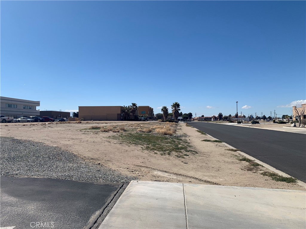 ±1.25 acres of unimproved commercial land for sale on Sand St in Victorville; APNs: 0396-162-07, 08, 09, 10, 11. Zoned Civic Business Center under the Civic Center Specific Plan, these 5 contiguous parcels will permit for the development of professional office and associated retail/service uses serving the neighboring government/service districts. Water, sewer, and power are all at site. This property is located in a Qualified Economic Opportunity Zone and may be eligible for preferential tax treatment. Neighboring businesses include Victorville City Hall, Victorville Superior Court, InterCon Security, Mojave Desert Air Quality Management District, The Woodall Group, and more. Buyer to verify all information contained herein. Agent and their representatives are not responsible for the accuracy of these claims.