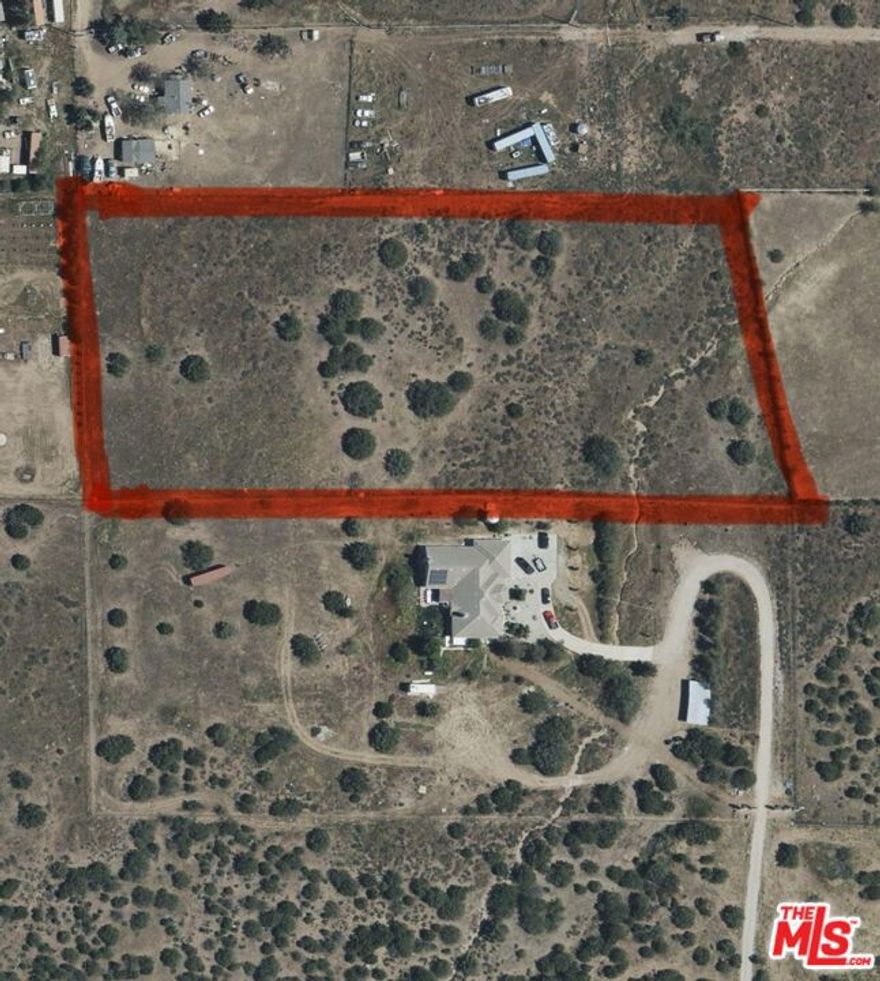 5.1 Acres of Scenic Luxury in Acton  Design & Build Your Private EstateUnveil the rare opportunity to own 5.1 acres of pristine land in the picturesque hills of Acton, Californian exclusive canvas for your architectural masterpiece. Perfectly positioned next to an existing luxury residence, this parcel offers the ideal blueprint to emulate its elegance or craft an entirely unique vision for your dream estate. Imagine a grand custom home surrounded by sweeping panoramic views, with ample room for resort-style amenities such as an infinity pool, guest casita, private equestrian facilities, lush gardens, or a vineyard. Here, privacy meets sophistication set against a backdrop of serene mountains and star-filled skies, yet just minutes from the 14 Freeway, Santa Clarita, and Los Angeles. With its generous scale and inspiring surroundings, this property invites the discerning buyer to create an unparalleled sanctuary that blends luxury living with the tranquility of the high desert. 1.) 5.1 acres of usable, estate-worthy land...2.) Adjacent to a refined existing home for inspiration...3.) Commanding mountain and valley vistas...4.) Perfect for equestrian estates, vineyards, or luxury resort amenities...5.) Conveniently located near major freeways, dining, and boutique shopping...6.) An exceptional investment in one of Acton's most desirable settingsSeize this rare opportunity to design a bespoke estate in a location where natural beauty and refined living meet.