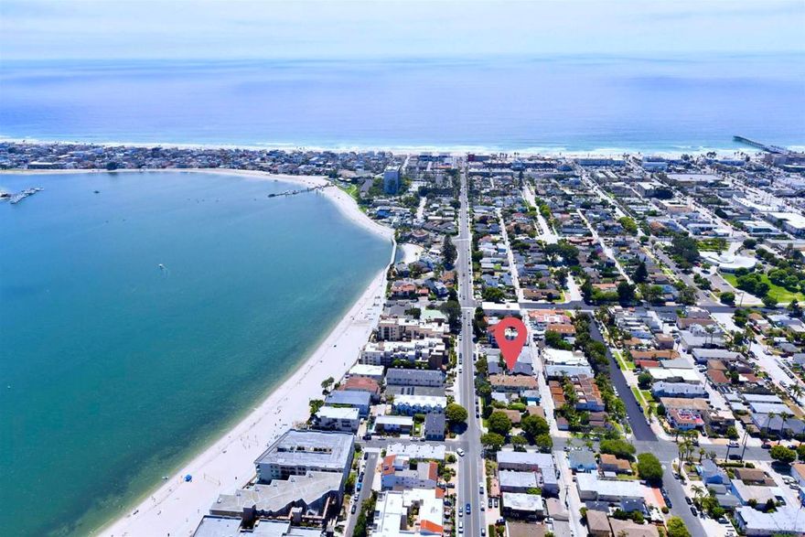 OPTIONS! Long term rental, Airbnb or potential condo conversion. $250,000+ current gross annual income. 1152-54 Pacific Beach Dr. is a premier four-unit investment property in the coveted Sail Bay neighborhood of Pacific Beach, San Diego. Originally constructed in 1980 and extensively renovated in 2023, this coastal gem features a desirable condo quality mix of one large four-bedroom/two-bath front house, one three-bedroom/two-bath unit, and two two-bedroom/two-bath units. Two single car garages are also at the rear of the building along with four surface parking spaces. The units are spacious, ranging from 800 to 2,000 square feet, boasting modern interiors with new kitchens, stainless steel appliances, marble countertops, and farm-style sinks. Select units include full-size washer/dryers, and all benefit from air conditioning and new dual-pane windows. Additional upgrades include a new 30 year roof, all new electrical sub-panels, iron security gates, EV charging stations and more. Ideally situated just one block from Sail Bay, residents enjoy proximity to the Bayside Boardwalk, Fanuel Street Park, and the Catamaran Resort, with the Pacific Ocean also a short walk away. Numerous shops, restaurants, and bars of Pacific Beach and Mission Beach are also within easy reach, enhancing the property’s appeal for residents. This versatile investment offers opportunities for long-term rentals, lucrative Airbnb potential, or potential condo conversion, with comparable nearby condos fetching nearly $1,000 per square foot.