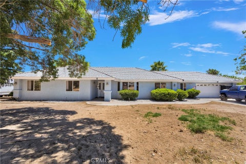Photo of 10325 Sheep Creek Rd RD, Phelan, CA 92371 (MLS # HD26171857)
