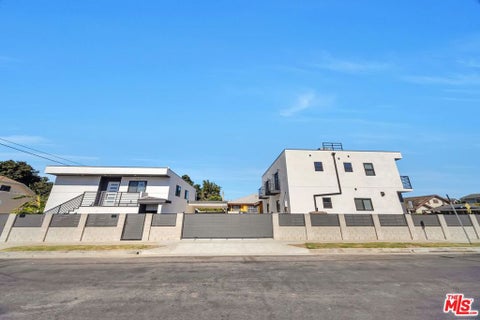 Photo of 1463 W 42nd Place, Los Angeles, CA 90062 (MLS # 26104263)