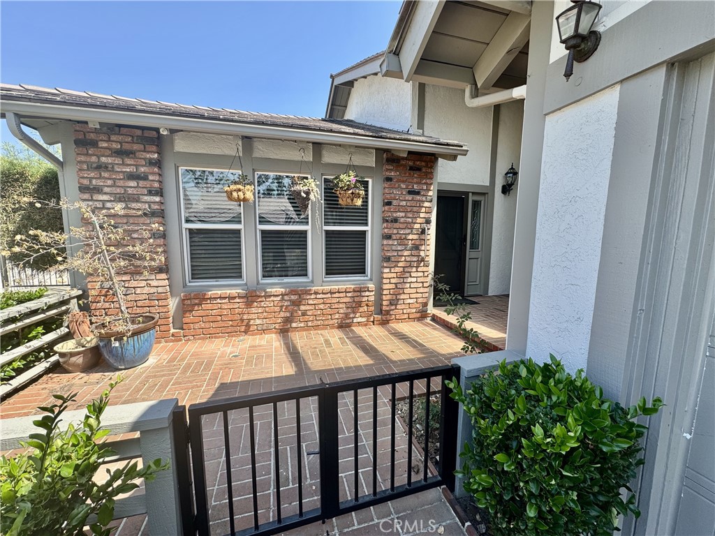Welcome to 12422 Tudor Way, a beautifully maintained single-story home located in the peaceful and established community of The Colony HOA in North Tustin. Offering 1574 sq ft of thoughtfully designed living space, this home features vaulted ceilings, quality upgrades, and a layout that emphasizes both openness and comfort—making it an ideal choice for both downsizers and families. The spacious primary suite includes a walk-in closet and a large en-suite bathroom, while two additional bedrooms provide flexible space for guests, a home office, or family needs. The living and dining areas are bright and inviting, enhanced by vaulted ceilings and excellent natural light, and are complemented by plantation-style window blinds throughout. The updated kitchen features a double oven, a brand-new dishwasher, and generous cabinetry for storage and functionality. French doors lead to a private patio with a newly added patio cover that opens directly to the community’s tennis court and pool, creating a perfect indoor-outdoor flow. The guest bathroom has been recently refreshed with a new vanity and cabinetry, and the home offers abundant storage throughout, including built-ins, closets, and garage shelving. Additional highlights include central air and heat, recessed lighting, in-home laundry, and an attached two-car garage with direct access.
The Colony HOA offers a quiet, walkable environment with lush, well-maintained landscaping, a resort-style pool, and a tennis court just steps from the backyard. This well-established neighborhood has a tranquil, 55+ feel while also attracting young families drawn to its excellent schools and desirable location. Residents enjoy walking distance to top-rated Tustin Unified schools, including Red Hill Elementary, Hewes Middle School, and Foothill High School. The home is just minutes from The Tustin Marketplace, Tustin Heights Shopping Center, and charming Old Town Tustin, with easy access to the 5, 22, 55, and 261 freeways for convenient commuting across Orange County. It’s also close to the nearby cities of Irvine and Orange, as well as parks, local dining, Trader Joe’s, and everyday essentials. This turnkey home is ready to be enjoyed! Open Houses will be on July 26th from 2-4 pm and July 29th from 5-7pm.