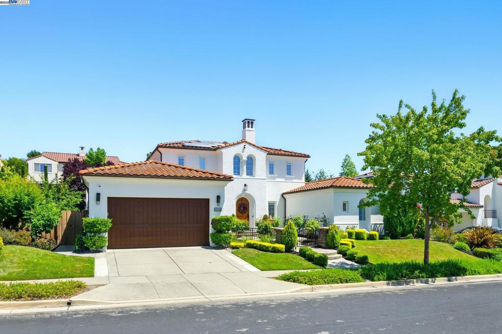 Open House 7/26 & 7/27 (2-4pm). Premium location within Bridges community for this beautifully updated & expanded Bixby Creek floorplan. Primary bedroom suite PLUS guest bedroom & additional full bath on the 1st floor. 3 additional bedrooms PLUS 2 full baths upstairs (1 bedroom suite w/1 full bath). Remodeled kitchen w/ large center island that seats 6. Open kitchen family room concept w/ backyard access. Freshly painted exterior. Designer paint interior, newer hardwood flooring & modern light fixtures. The gorgeous open kitchen features quartz island countertop, stainless steel appliances w/ built-in 5-burner gas cooktop, newer cabinets, subway tile backsplash & soft closing cabinets. The primary bedroom suite has been expanded for extra convenience of an office or work out area w/ backyard access. The spa-like bathroom highlights double sinks, vanity, jetted tub, walk-in shower & large double walk-in closet. Inviting large foyer w/ 2-story high ceiling leads into open living & dining area. Both living areas w/ gas fireplaces. Lots of natural light. The expansive sun-filled backyard boasts a large lush lawn, vineyards, slate patio & built-in BBQ. Solar with 2 battery backups. Closely located near parks, recreation, City Center & within top-rated SRVUSD.