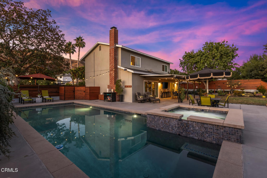 First time on the market in 55 years - pride of ownership is evident in every detail of this beautifully updated home. Located in the desirable Lake View Terrace neighborhood, this thoughtfully renovated residence delivers exceptional living inside and out.Set on a quiet residential street, the home features a bright, open layout with modern updates and effortless flow. The refreshed kitchen connects seamlessly to the living and dining areas, creating a space that feels both open and inviting while maintaining distinct zones for everyday life and entertaining. The main-floor ensuite offers comfort and privacy, while three additional bedrooms upstairs provide flexibility for family, guests, or a home office.Step outside to your own private oasis - an expansive backyard designed for year-round enjoyment. A sparkling pool, relaxing spa, spacious patio, and mature fruit trees make this the ideal setting for entertaining or unwinding at home.This Lake View Terrace gem offers the perfect blend of designer style, function, and outdoor living.