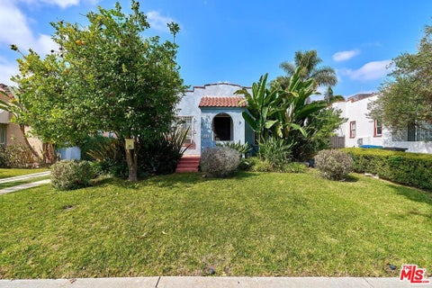 Photo of 2115 S Mansfield Avenue, Los Angeles, CA 90016 (MLS # 26870741)