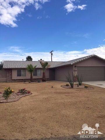 WOW!! 3 BEDROOMS AND 2 FULL BATHROOMS,ALSO fireplace.in GREAT ROOM,,CEILING fans throught,,.Granite kitchen COUNTERS, and BATHROOM COUNTERSgoIN septic,, ALL TILE THROUGHOUT THIS HOME. NEWER A/C COPPER LINE, NEWER GARAGE DOOR, TOO MANY OTHER IMPROVEMENTS TO LIST. Schedule an appt. OH AND A GREAT CORNER LOT to add RV gate .
