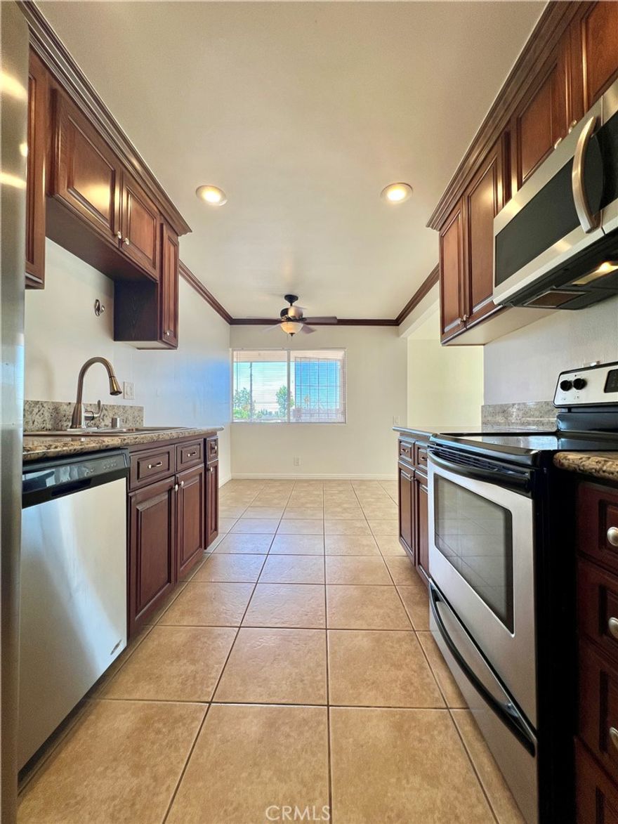 ***PRICE REDUCED***** Move-in ready, no deferred maintenance!

***Recently updated with NEW Paint, NEW flooring and Reglazed shower!

Welcome home to this charming 2-bedroom, 1-bath condo located in the desirable gated community of Cinnamon Tree in Placentia! Priced attractively at $419,777, this bright and inviting unit boasts 845 square feet of thoughtfully designed living space. Step into the deluxe kitchen featuring modern stainless steel appliances, perfect for the home chef. The spacious master bedroom offers an expansive closet, while the second bedroom provides a generous walk-in closet, ideal for guests or additional storage. Enjoy comfort year-round with the efficient wall air conditioner in the welcoming living area.

Conveniently located near major freeways, shopping centers, parks, the local library, and esteemed schools—including just minutes from Cal State Fullerton—this condo offers unparalleled accessibility. Additional perks include a private storage area right next to your front door, one assigned covered carport space, plus potential for additional permitted parking. HOA amenities include water, trash, and sewer services, along with access to two sparkling community pools and a relaxing spa.

Perfectly maintained by a smoke-free owner, this delightful condo is ready for its next chapter. Don't miss this fantastic opportunity to live in one of Placentia's most convenient and charming communities!