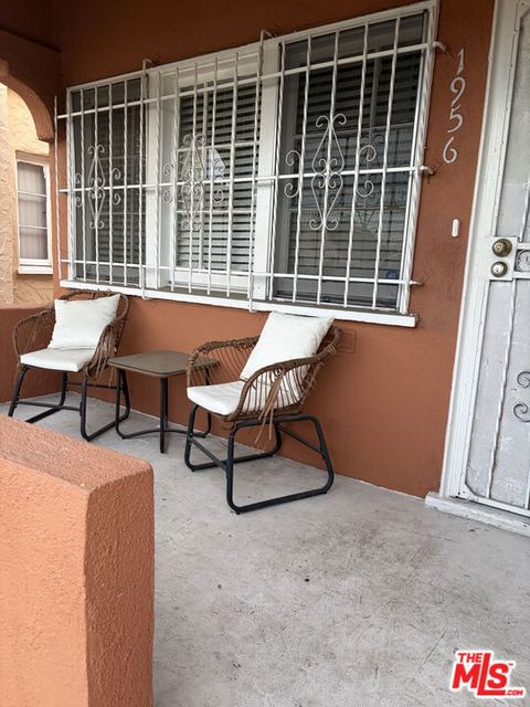 Photo of 1956 W 73rd Street, Los Angeles, CA 90047 (MLS # 26646165)