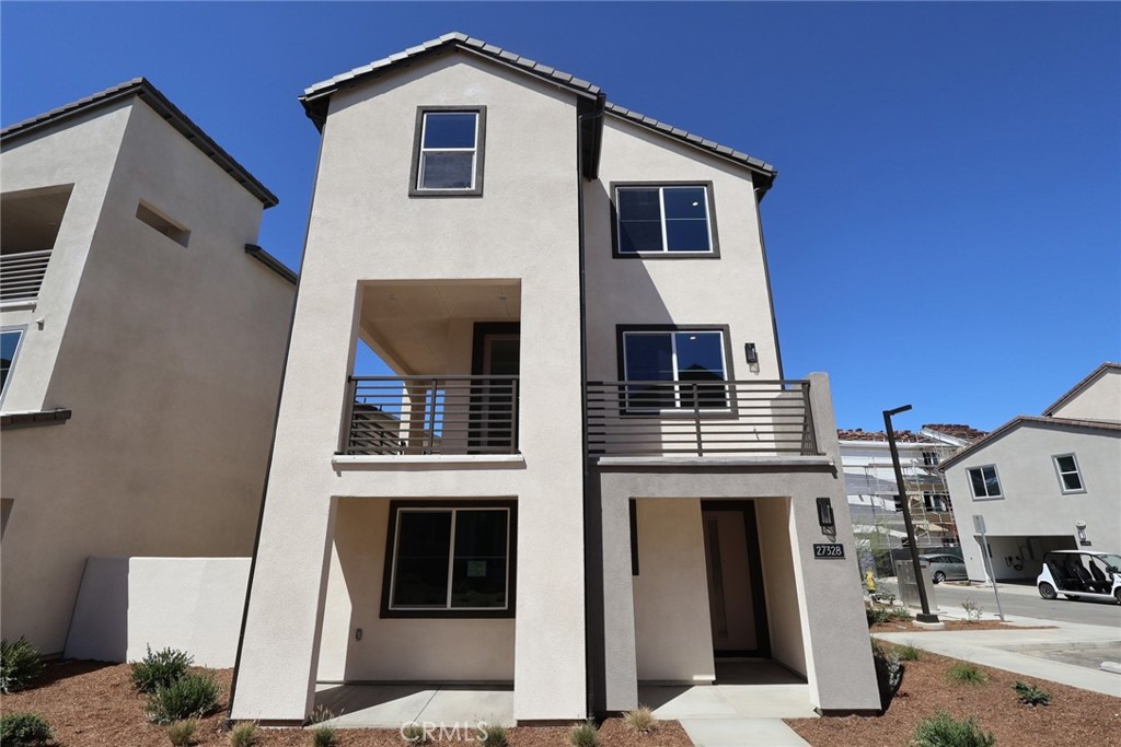 This is a Plan 2 Lark home by Tri Pointe Homes in Valencia. This home features 4 beds/3.5 baths with a spacious layout and is ready for Move-In. On a corner location this home is equipped with a full bed and bath downstairs, expansive main living area on the second floor with a step out wrapped balcony, this home is truly unique and a must see.