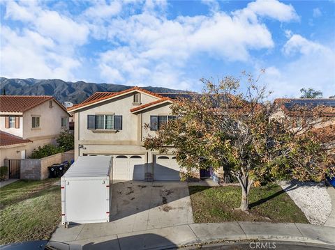 Photo of 14956 Genoa Dr, Fontana, CA 92336 (MLS # CV25272135)