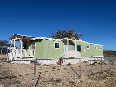 Photo of 233 Desert Breeze Dr, California City, CA 93505 (MLS # SB25257384)
