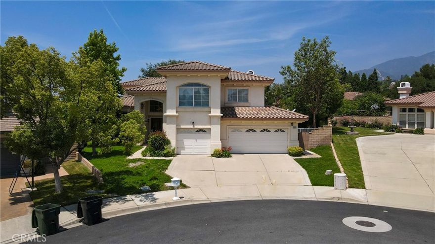 Located in the prestigious San Antonio Heights neighborhood, this beautifully remolded two-story home offers 3,568 square feet of living space with 5 bedrooms and 3 bathrooms on a spacious 10,010 square foot lot on a well maintained exclusive cul de sac.There is an optional bottom office that can be converted to a bedroom.  The choice is yours to make. The property features an attached 3 car garage and a charming covered overhang entrance.  Inside, sophisticated design and luxury vinyl plank (LVP) flooring lead to striking entry way with a dramatic two-story ceiling. Adjacent is the formal living room, seamlessly connecting to the open-concept great room-perfect for entertaining. The remodeled chef’s kitchen is a standout, featuring designer touches. The adjoining family room is spacious enough for a large screen TV. There are 3 fireplaces. The back yard has many fruit trees- orange, apples, avocado, lemon and grapes.. Room for a pool / fountain on the side of the home. Located in an award winning school district and close to world class shopping, Ontario International Airport, and major freeways (210 & 10), this home offers both convenience and elegance. There is no HOA, tax rate 1.08 *, this is a rare find. Schedule your showing today.. ACCEPTING BACK UP OFFERS.
