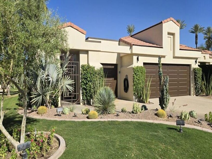 ***OPEN HOUSE SATURDAY DECEMBER 20, 2025 FROM 12 NOON TO 2PM*** Tucked within the serene Desert Horizons Country Club in Indian Wells California is this elegant desert retreat that captures the essence of resort-style living with an atmosphere of refined sophistication. Perfectly positioned on a premier interior lot overlooking the 13th fairway, a tranquil waterfall, and the majestic Santa Rosa Mountains, this residence invites guests to relax, recharge, and revel in the beauty of the desert landscape. The grand living area is bathed in natural light where marble floors, vaulted ceilings, a see-through fireplace, a wet bar and neutral tones create a feeling of calming openness. The kitchen offers stainless steel appliances, granite countertops, a central island and panoramic views of the pool and golf course through wraparound picture windows. The large open ensuite primary bedroom features a seating area, a spa-style jetted tub, a grand walk-in shower that all have marble finishes. Two ensuite guest rooms provide private get-aways designed for rest, comfort and quiet retreat after sun-soaked desert days. The home has been meticulously maintained and has a lot to offer including a paid off solar system, 2 car plus golf cart garage, mature fruit trees and a sparkling pool/spa. Located in one of Indian Wells most desirable communities you'll enjoy access to world-class golf, tennis and country club amenities while being minutes from El Paseo's upscale shopping and dining, Indian Wells Tennis Garden, and the scenic trails of the Santa Rosa foothills. With its seamless indoor-outdoor flow, luxurious amenities, and breathtaking views, this home is the perfect desert escape for those seeking beauty, comfort, and serenity in equal measure.