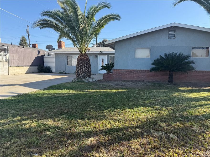 Perfect Investment Opportunity! Ideal for investors or owner-users looking to add value, this home provides a flexible layout and a spacious lot provides plenty of outdoor space for gardening and/or entertaining. Rear yard has mature fruit bearing trees - Oranges, Figs & Lemons. Conveniently located near schools, shopping, and major roadways, this home is perfect for first-time buyers or those looking for a low-maintenance investment property. This property offers plenty of potential with room for expansion and the possibility to convert the existing garage into an ADU (buyer to verify) for additional cash flow.