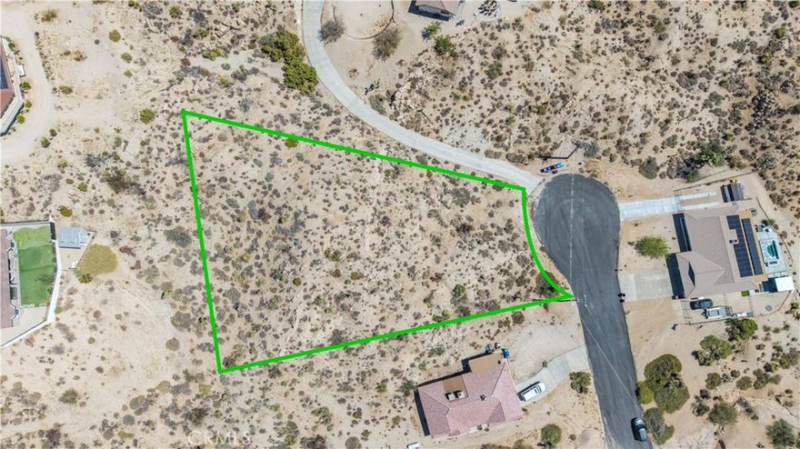 Opportunity awaits with this 34,158 square foot parcel in Yucca Valley’s sought-after Western Hills Estates. The buildable lot offers beautiful views and an excellent setting to create your dream home or a short-term rental in a desirable location. Enjoy the convenience of being just minutes from downtown Yucca Valley with its local shops, dining, and community events, while also being close to Joshua Tree National Park for world-class hiking, climbing, and stargazing. Pioneertown and the legendary Pappy & Harriet’s are a short drive away, adding music and entertainment to the list of nearby attractions. This property provides both tranquility and easy access to the best of the High Desert lifestyle. Buyer to verify utilities and zoning.