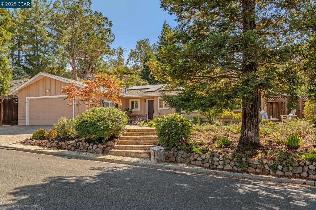 Pride of ownership shines in this sun-drenched single-story rancher, where thoughtful updates meet timeless comfort. At the heart of the home, the newly remodeled great room and kitchen showcase quartz counters, hardwood floors, and an open flow designed for both everyday living and effortless entertaining. Walls of glass frame the sparkling Pebbletec pool with cascading waterfalls and spa, creating a backyard retreat you’ll never want to leave. The versatile floor plan includes four bedrooms, with one featuring a Murphy bed that flexes easily as a guest room, office, or play space. The expansive primary suite is a true sanctuary, complete with a sitting area, oversized walk-in closet, marble bath, and French doors that open to the serene backyard. Sustainability and convenience shine with solar power for both the home and pool, while a separate workshop and bonus room provide additional space to work or play. A three-level tiered vegetable garden with built-in irrigation rounds out this exceptional lifestyle package. Private and peaceful, yet just minutes to downtown, shopping, freeways, and award-winning schools, this home is as practical as it is inspiring. A must see- come visit today!