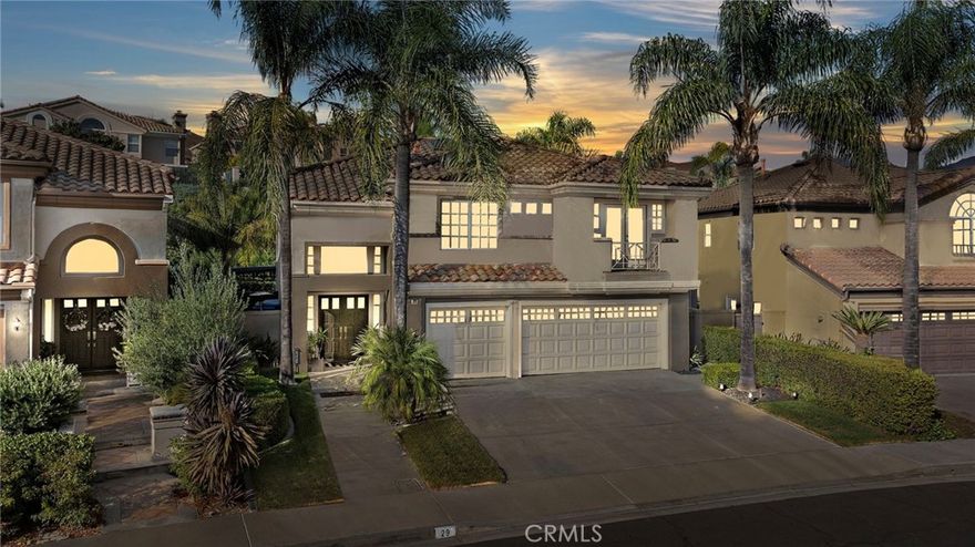 Perched on a scenic hillside in Foothill Ranch, 29 Bell Vista blends luxury, smart upgrades, and breathtaking unobstructed hillside views.

Step through a dramatic double-door entry into a sun-filled lower level with soaring ceilings and expansive windows. Entertain effortlessly in the open-concept living and dining area, featuring French doors that connect to the outdoor space. The remodeled kitchen is a chef’s dream with quartz countertops, matching backsplash, built-in wine fridge, stainless-steel appliances, and a new microwave. An 8-foot picture window perfectly frames the sparkling backyard pool. The family room centerpiece is a cozy fireplace, ideal for gatherings. A convenient laundry room is also located on the lower level, adding functionality and ease.

A stunning curved staircase with circular skylight leads upstairs to all bedrooms and a versatile bonus room, perfect for a home office, playroom, or media space. The oversized primary suite is a private retreat with vaulted ceilings, a walk-in closet, and a spa-like bath with soaking tub and enclosed shower. Spacious bedrooms and newly replaced upstairs carpet complete the level.

The backyard is a resort-style oasis with a luxurious 14-foot pergola with lighting and outdoor TV, and a fully app-controlled Aqualink pool and spa system. App-controlled sprinklers maintain the lush front, side, and back yards effortlessly.

The garage is fully finished with painted ceilings, walls, and floors, bright fluorescent lighting, and a Chamberlain side-mount garage door opener with app operation. A 240V outlet is ready for EV charging.

Smart-home features include a Ring doorbell camera and Nest thermostat. The home also offers an extra-wide driveway for convenience and enhanced curb appeal.

Foothill Ranch is known for its award-winning schools and an abundance of community amenities such as parks, hiking and biking trails, a skate park, and a neighborhood pool. Nearby attractions include Whiting Ranch Wilderness Park for outdoor adventures, the Foothill Ranch Towne Centre with shopping, dining, and entertainment options, and easy access to the 241 Toll Road for commuting.

This home combines thoughtful upgrades, spacious interiors, and a spectacular setting — making 29 Bell Vista an exceptional opportunity in one of Orange County’s most desirable communities.