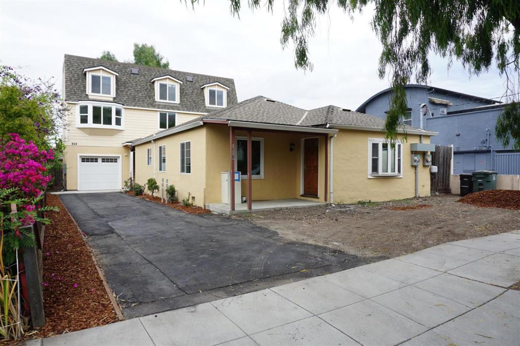 Welcome to the charming 4-bedroom, 4-bathroom homes located in the vibrant city of Mountain View. Spanning 1,913 square feet, in total with 1213 sf in the front home and 800 sf in the back home ADU. These homes provides ample space for comfortable living. The kitchen areas features a convenient electric cooktop, and a gas cooktop in the main home perfect for culinary enthusiasts. Enjoy cozy evenings in the separate family rooms. These homes are adorned with durable laminate flooring throughout, offering a sleek and modern look. Tiled bathrooms. For your convenience, the laundry area is located inside, making chores a breeze. The bathrooms are well-equipped with a combination of shower and tub, as well as a stall shower, providing flexibility for your daily routines. This property falls within the Mountain View Whisman Elementary School District. Additional features include central forced air heating and other cooling systems to ensure year-round comfort. With a minimum lot size of approximately 4,550 square feet, this home offers both indoor and outdoor living opportunities. Don't miss the chance to make this Mountain View gem your own!