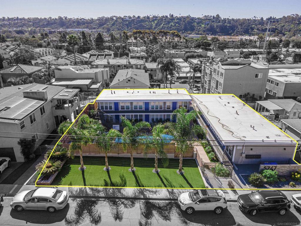 We are pleased to present THE PALMS, a 12-unit multifamily investment in San Diego’s desirable Linda Vista neighborhood, directly across from the University of San Diego (USD). Built in 1962 and extensively renovated in 2017, the property blends modern upgrades with mid-century charm. Situated on a 9,984 SF lot, it features ten (10) one-bed/one-bath units and two (2) studios, totaling ~6,350 rentable SF. Each unit is separately metered for gas and electricity, ensuring cost-efficient operations. Highlights: Fully renovated interiors with granite countertops, new cabinetry, stainless steel appliances, luxury vinyl plank flooring, updated baths, lighting, and fresh paint. One unit has in-unit laundry; new plumbing on the first floor of Building 1. Exterior upgrades include dual-pane windows, new roof (2017), fresh paint, enhanced pool and deck, new concrete, fencing, patio furniture, updated landscaping, controlled access, owner-operated laundry, and six (6) storage units for added income. The Palms offers a walkable location with retail, dining, shopping, and recreation nearby. Steps from USD, with 9,041 enrolled in 2025, it is ideal for students and faculty. This is a fully renovated, stabilized asset with strong rental demand and low maintenance. Upside potential includes implementing RUBS for utility cost recovery and adjusting rents to market rates, enhancing NOI, cash flow, and ROI.