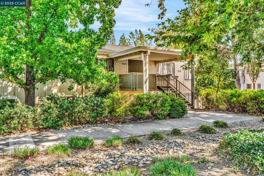 Beautifully updated and filled with natural light, this spacious home offers exceptional comfort in the desirable Rossmoor community. The inviting living room flows seamlessly to an enclosed balcony, showcasing serene views of the lush greenbelt.A welcoming formal entry leads to two spacious bedrooms with generous closet space, a formal dining area, and a kitchen with a convenient breakfast bar. The home also includes in-unit laundry, 1 carport and storage. Recently updated with laminate flooring throughout and fresh interior paint.  Conveniently located near the main entry and within close proximity to Rossmoor’s premier community amenities.