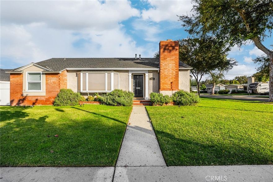 Welcome to this charming home with exceptional curb appeal, nestled in a pride-of-ownership neighborhood. Offering 3 spacious bedrooms with wood flooring, including a primary bedroom with direct access to the backyard. Both the guest and primary bathrooms have a clean, modern look. The bright living room showcases a large bay window and warm wood flooring, while the formal dining area also features a bay window and a cozy brick fireplace, positioned just off the kitchen for seamless flow. The spacious kitchen includes wood cabinets, granite countertops, ample storage, and a charming country-style door that opens directly to the pool area, perfect for effortless indoor-outdoor entertaining. The indoor laundry area is conveniently located just behind the kitchen. As you enter the family room, you’ll find a versatile space ideal for a second dining space or office work area. The family room offers a second fireplace and a warm, rustic ambiance highlighted by vaulted wood ceilings, creating the perfect environment to unwind, enjoy movie nights, or host gatherings. Beautiful wood French doors open to the covered patio and sparkling pool, surrounded by low-maintenance landscaping, an ideal setting for both relaxing and entertaining. The home also includes solar panels to help keep your electric bill low. It's a must-see! Professional photos to follow.