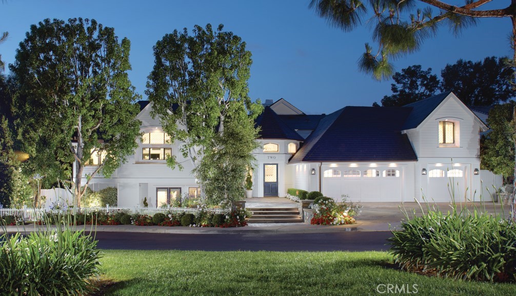 Gracefully perched along the iconic 15th hole in the heart of Newport Beach’s exclusive guard-gated community of Big Canyon, this masterfully reimagined estate captures front-row fairway views and the serene beauty of a striking par-3 played over water. A true architectural showpiece, the home was taken down to the studs and transformed by the renowned Amber Interiors, blending bespoke finishes with timeless California elegance.
Inside, rich walnut floors, custom millwork, designer lighting, and hand-selected wallpapers create a layered, textural experience that feels both refined and warmly livable. The interiors evoke a curated calm—where organic materials, soft architectural lines, and thoughtful craftsmanship create an ambiance that is both elevated and inviting.
Designed for modern living, the home is powered by solar energy and enhanced with integrated smart home features including Control4 automation, surround sound, video surveillance, and more. Outside, a resort-inspired backyard features a PebbleTec saltwater pool, lush landscaping, and multiple entertaining spaces, making large-scale gatherings effortless.
Upstairs, the sun-drenched primary suite offers a tranquil escape with sweeping fairway views, luxurious finishes, dual closets, and a spa-like bathroom retreat that provides peaceful seclusion.
Homes of this caliber are rare—crafted with premium materials, top-tier construction, and a level of customization that would be extraordinarily costly to replicate today. From the quality of the build to the attention to detail, this estate represents a standard that truly stands apart.
Just moments from Fashion Island, Newport Harbor, world-class beaches, and top-tier schools, this exceptional residence offers not just a home, but a lifestyle of design, ease, and distinction—set within one of Orange County’s most prestigious communities.