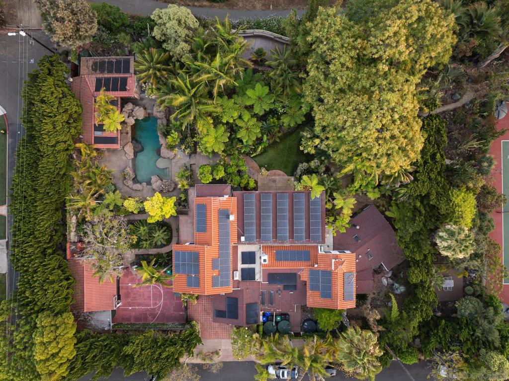 After four decades, the Walton Estate is hitting the market! This is a rare opportunity to own 1.3 acres in Hillcrest / Marston Hills if you purchase both parcels together—1010 and 1034 Myrtle Way. 1010 Myrtle sits on .7 acres and offers a piece of San Diego history that rarely comes up for sale. The main home is generous—seven bedrooms, eight baths, each with its own en suite, nearly 6,300 square feet of living space. The bar room is the original 1,000 square feet of the house where everything began. The current primary suite has a private garden and could be converted to an ADU if you’re looking for flexible space. Out back, you’ll find a pool and grotto inspired by Bill and Lori Walton’s travels to Australia, surrounded by mature landscaping and private paths that weave through waterfalls and a 100 year old Tipowana tree. This home is real, lived in and loved. Layers of life, gatherings, music, and memory fill these walls. The property is quiet, with space to roam and room to grow, just minutes from Balboa Park and the Zoo. This is a rare chance to take something with so much history and make it your own.