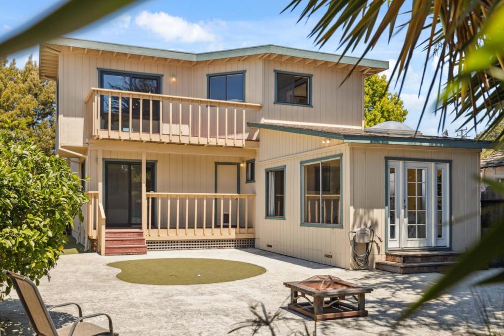 Experience the quintessential coastal lifestyle at 336 Rio Del Mar Blvd. This 3-bedroom, 2-bathroom home offers easy access to Rio Del Mar Beach, Santa Cruz County's longest stretch of sandand is just around the corner from Seascape Golf Course. The thoughtfully designed floor plan provides excellent separation of space while maximizing every corner of the home. A bonus flex space, currently used as a sun-filled solarium, could also serve as a home office, art studio, or fitness room. The kitchen flows seamlessly into the dining area and features a charming bay window over the sink, a dine-in breakfast counter, and multiple skylights that fill the home with natural light. Outdoor spaces are ideal for entertaining, with a putting green to hone your skills, a shaded area ideal for dining al fresco, and low-maintenance hardscaping. Nearby, enjoy miles of hiking and biking in Nisene Marks State Park or explore the vibrant local shops, restaurants, such as Venus Spirits, and locally owned grocery stores. Whether relaxing at the beach, hosting guests, or enjoying the sunset from your own backyard, 336 Rio Del Mar Blvd invites you to make the most of coastal California living.