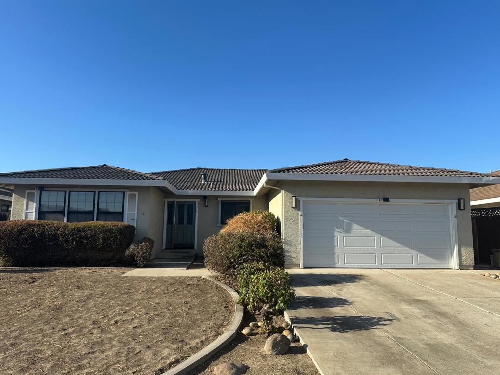 This spacious residence offers 3 bedrooms and 2 bathrooms over 1,845 square feet of living space on a 6,399 sf lot. The kitchen is a chef's delight, featuring a garden window, gas cooktop, double ovens, microwave, dishwasher, tile countertops, spacious breakfast bar & nook. The kitchen seamlessly connects to the family room, providing a cozy atmosphere with a wood burning fireplace, perfect for gatherings. The home is equipped with Alarm System, Air Conditioning and central forced air heating to ensure year-round comfort. The interior showcases beautiful laminate flooring throughout. The primary bedroom includes a walk-in closet, adding to the home's ample storage options. Additional amenities include a large fully fenced yard, outdoor covered patio and a shed for your extra storage needs. Don't miss the opportunity to make this delightful Hollister home yours!