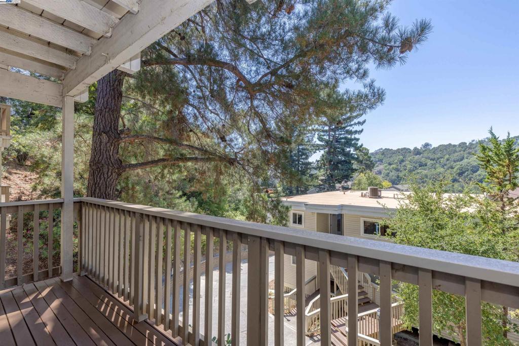 Welcome to 118 Ascot Ct, a beautifully updated condo in the heart of Moraga! Originally a 1-bedroom, 1-bath unit, this home has been thoughtfully converted to include a second bedroom, offering added versatility and value. The spacious layout features an updated kitchen complete with stainless steel appliances, granite countertops, and a stylish tile backsplash. Enjoy the convenience of in-unit laundry and a large walk-in storage closet in the hallway. Step outside to your private balcony and take in stunning mountain views — the perfect spot to unwind. Ideally located near Rheem Valley Shopping Center, charming downtown Moraga, and a variety of parks, trails, and outdoor recreational areas. This centrally located gem blends comfort, convenience, and scenic beauty — a must-see opportunity! Come join us at the Open house on 7/20, 230-430pm
