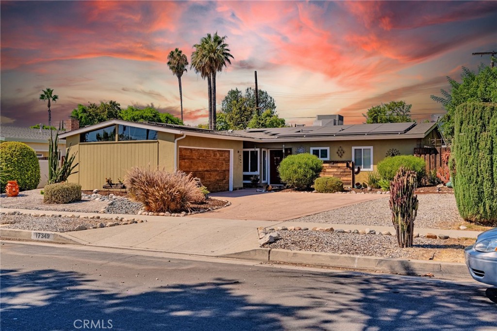 Conveniently located near everything the Valley has to offer, this 4-bedroom, 2-bathroom Lake Balboa home is move-in ready or perfect for your dream renovation. Features include smooth ceilings, gorgeous tile floors, dual-pane windows, updated shower, a galley kitchen with stainless steel appliances and custom cabinets brimming with charm. French doors open to an entertainer’s backyard, flooding the interior with natural light. Step outside to discover a private pool with cabana, wood deck, fire pit, and waterfall—your personal oasis awaits.
Enjoy major energy savings with fully paid-off solar panels—no extra costs, just lower bills. The front yard offers impressive curb appeal with established xeriscaping, a 2-car garage, and designated RV parking for added convenience and functionality. This home is ready to impress—don’t miss your chance to make it yours!