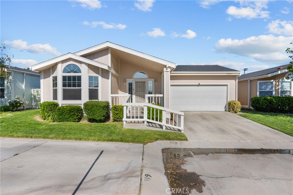 Welcome home to this spacious and beautifully maintained 3-bedroom, 2-bath manufactured home with a 2-car garage, nestled in a desirable guard-gated community! This 1,792 sq. ft. home is move-in ready and offers comfort, style, and functionality. Step up the front ramp with sturdy rails to a welcoming front porch, perfect for relaxing evenings.
Inside, enjoy wood laminate flooring throughout, high ceilings, and attractive baseboards that enhance the home's open and airy feel. Ceiling fans in the dining room, primary bedroom, and second bedroom add year-round comfort. The large kitchen features an abundance of warm wood cabinetry, white appliances, and ample counter space for all your cooking needs.
The spacious primary bedroom includes private backyard access, perfect for peaceful morning coffee or evening wind-downs. The luxurious primary bathroom boasts double-door entry, a soaking tub, separate walk-in shower, dual vanities, and plenty of space. The hall bath includes stylish wainscoting and additional cabinetry for storage.
Outside, enjoy a beautiful and private backyard, complete with a dog run for your furry friends. A brand new composition roof has just been installed with permits, and the HVAC system has been recently serviced and is in excellent working condition.
Located in a sought-after community offering pools, spas, tennis and basketball courts, a park, and RV parking—this home combines low-maintenance living with resort-style amenities. Don’t miss this one! Close to shopping and schools!