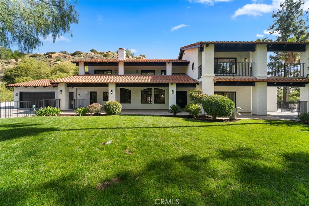 Hilltop Beauty in Exclusive Guard-Gated Bell Canyon
Perched atop a private hill at the end of a long driveway, this nearly 4,000 sq ft residence offers unmatched privacy and stunning panoramic mountain views. Thoughtfully remodeled throughout, the home blends modern luxury with the natural serenity of country living. The open-concept layout features expansive glass sliders that flood the living spaces with light and frame breathtaking nature views.
The gourmet kitchen is a chef’s dream, complete with quartz countertops, custom cabinetry, a wet bar, and top-of-the-line Viking appliances. Spa-inspired bathrooms showcase elegant finishes, rainfall shower heads, and a stand-alone soaking tub. The primary suite is a true retreat, featuring French doors that open to a spacious balcony overlooking sweeping vistas.
Set on over an acre, the expansive, park-like grounds include a rare, usable flat area—ideal for RV/boat parking, a private equestrian setup, sports court, pool, guest house, or your dream outdoor entertaining space. The possibilities are endless.
Enjoy the best of Bell Canyon living with 24-hour guard-gated security, access to the award-winning Las Virgenes School District, miles of scenic hiking and equestrian trails, a private park, tennis and pickleball courts, a fitness center, and a community clubhouse.