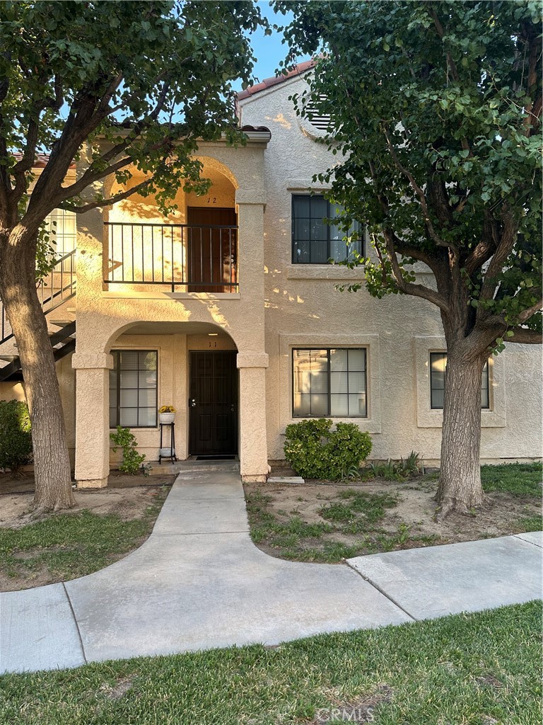 Wonderful, sought-after area, great location, and chance to enter the housing market. Close to freeway (for ease and commute), easy shopping, grocery stores, drug stores' many quick and sit down restaurants, plus local -very close convenience of big chain department stores (home depot, target, etc.) This condo-complex offers Two pools and spas, private security, carports, two laundry rooms, with bathrooms, a very nice and well-kept green belt. your condo provides a Private balcony plus a very nice size porch cover for condo entry, with TWO full bedrooms plus TWO full baths, in-unit laundry room for your stackable washer & dryer.
A wonderful convenient kitchen, dining area in the living room area, everything that you need at your finger tips. This unit provides you the opportunity to design and decorate on your own time schedule, as you prefer, perched high offering you your own privacy and view. Hurry while it is available. Probate Listing, sold "AS IS".